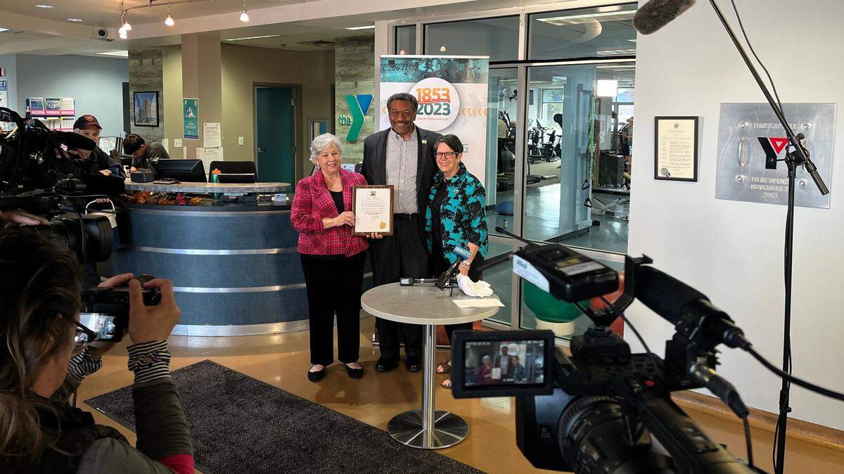 (From left) YMCA of Central Kentucky President & CEO Paula Anderson, YMCA of Central Kentucky Executive Committee Chair and Mayor Linda Gorton pose for a photo after Gorton declared November as YMCA Month in honor of the group celebrating its 170th birthday.
