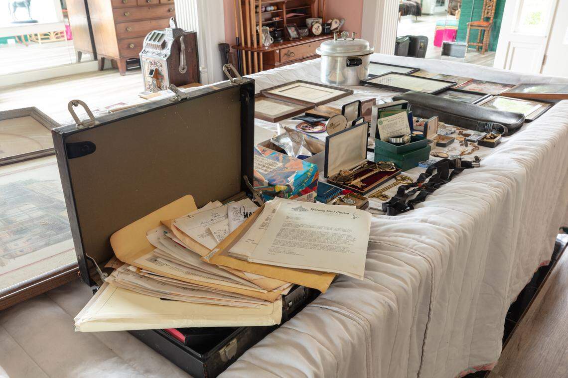 Other memorabilia in the Claudia Sanders Dinner House sale includes pressure cookers, engraved with Colonel Sanders name and letters such as one from President Richard Nixon.