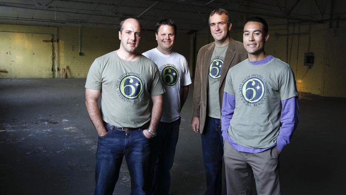 West Sixth Brewing Co. founders Joe Kuosman, left, Brady Barlow, Ben Self and Robin Sither plan to open the brewery in part of the  former Rainbo bakery. The building itself will become The Bread Box, a retail and business development shown in the rendering above. 
