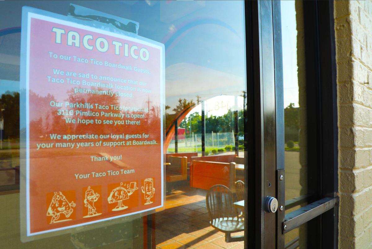 Exterior shot of Taco Tico closure announcement posted to the side entry door at Boardwalk location.