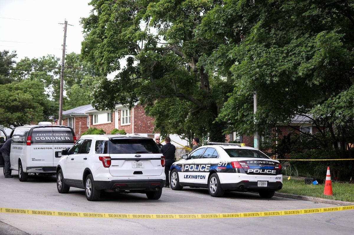 Police and Fayette County coroner on the scene of a triple homicide off of Caywood and Alexandria Drives in Lexington, Ky., Wednesday, May 25, 2022.