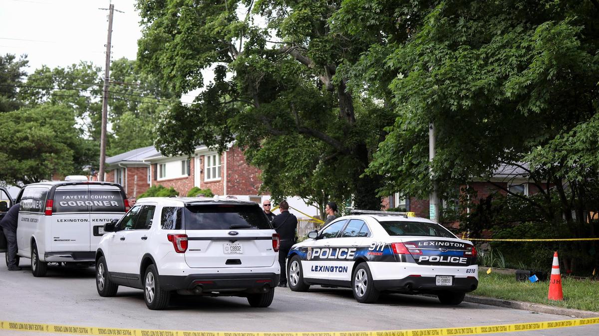 Police and Fayette County coroner on the scene of a triple homicide off of Caywood and Alexandria Drives in Lexington, Ky., Wednesday, May 25, 2022.