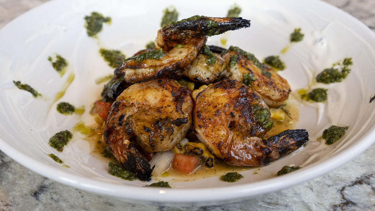 Wood Grilled Chimichurri Shrimp ($16.95) at Firebirds Wood Fired Grill’s is prepared with whipped goat cheese and charred corn salsa.