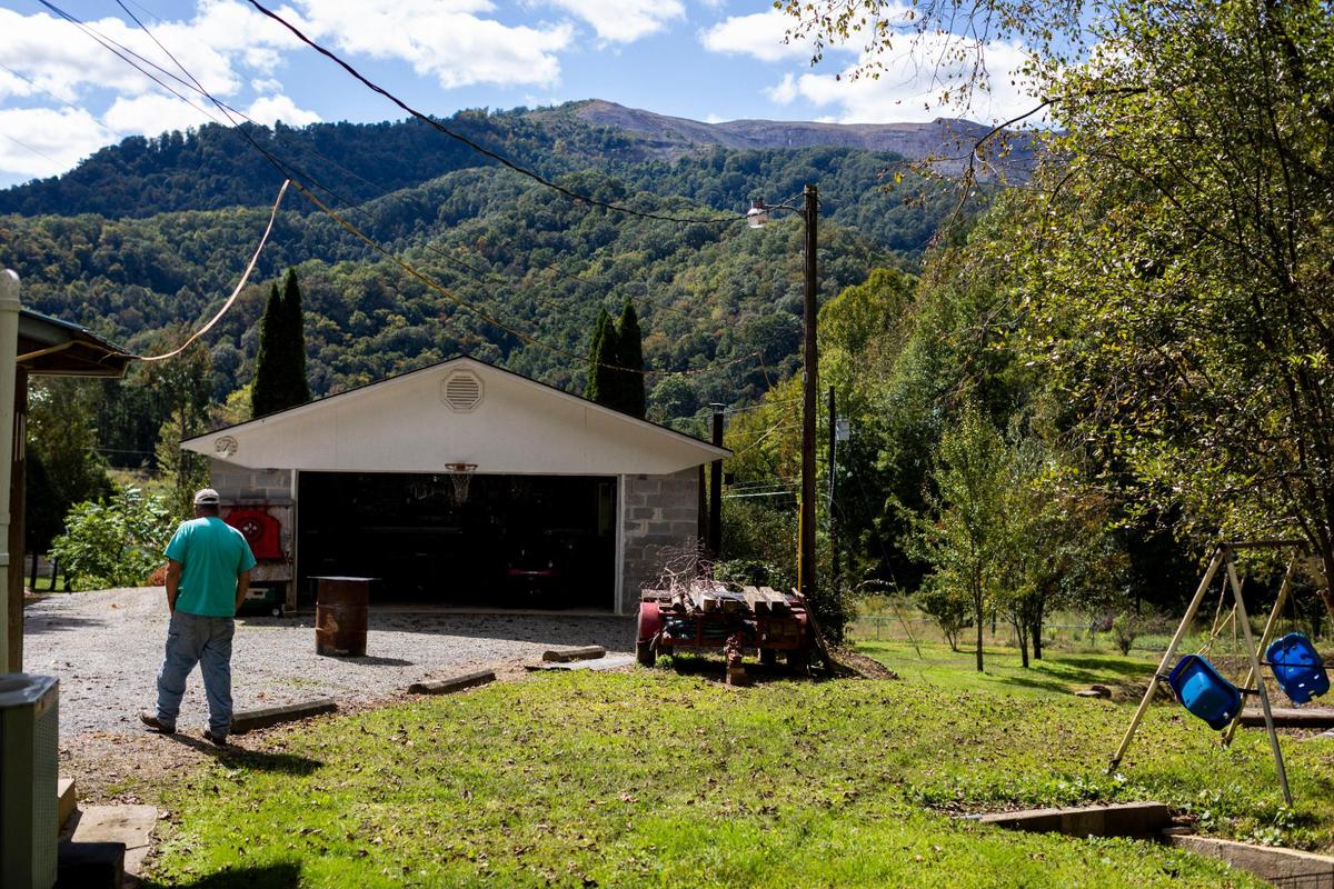 A Blackjewel strip-mine can be seen across from Elvis Sowders’ property in Wallins Creek, Harlan County, Ky., Friday, October 2, 2020. The foundation of Sowders house and sheds have been damaged due to sonic waves from the blasting at the mine that traveled up the holler. Sowders said that many of his neighbors have cracks and damage with their property as well, but the mine company has denied the damage was caused by the blasting.