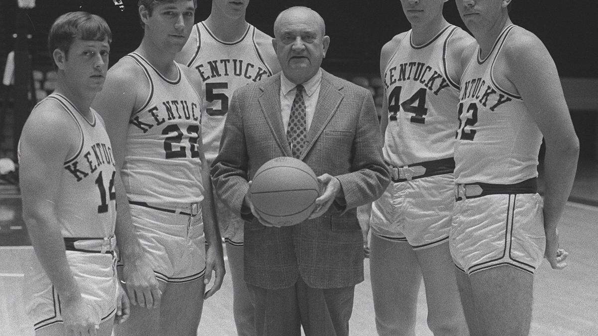 1969 FILE PHOTO. University of Kentucky basketball coach Adolph Rupp, center  , with his senior players prior to the 1969-70 basketball season in Memorial  Coliseum, Lexington, KY, October 14, 1969. Players from left to right are:  Bill Busey, Mike Pratt, Art Laib, Dan Issel and Randy Pool.