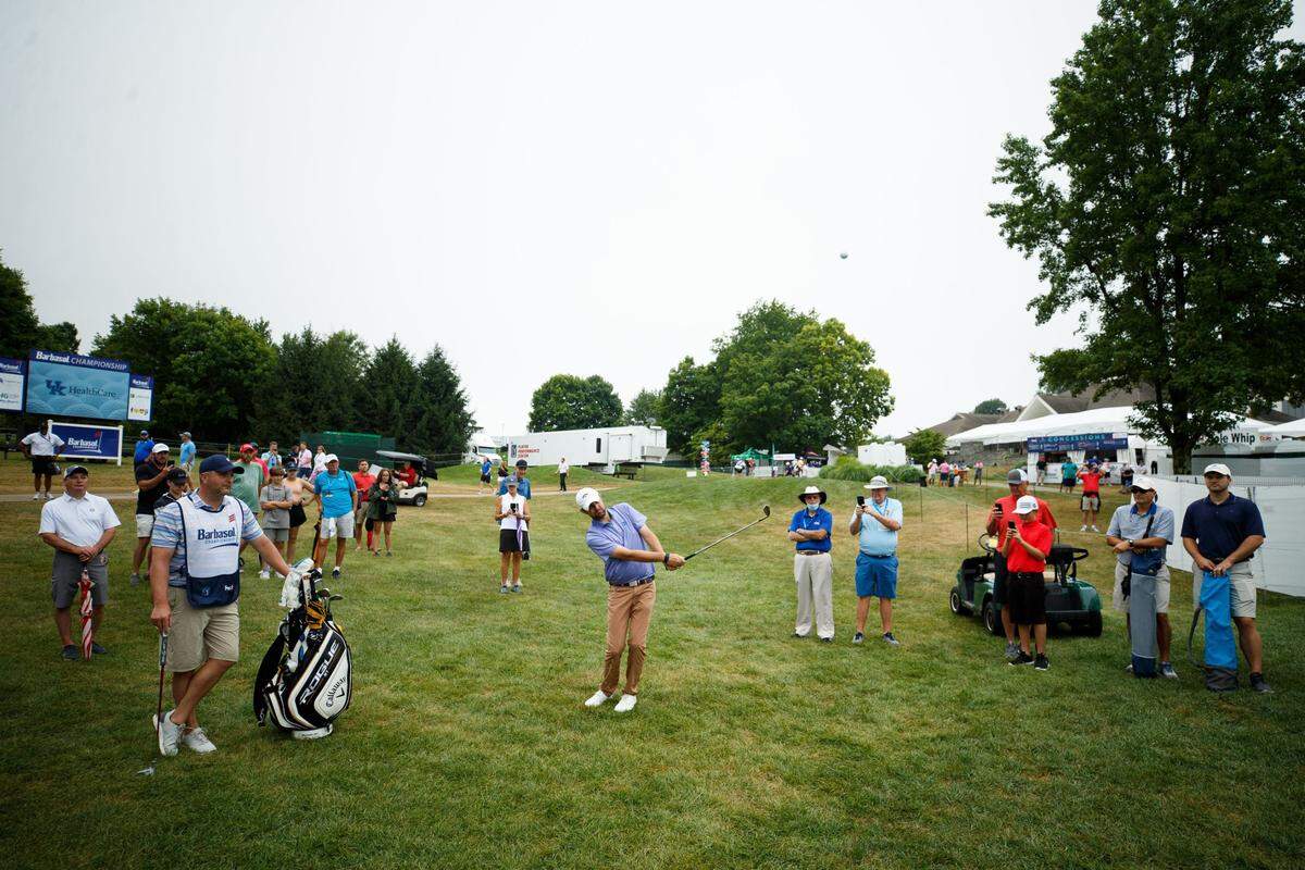 Andrew Stephens plays his third shot on No. 9 after his errant tee shot landed in a trash can during the second round of the PGA Barbasol Championship on Saturday at Keene Trace Golf Club.