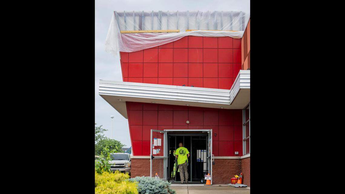 A worker walks into the building during construction of a new dispensary July 9, 2025, at the old Frisch’s Big Boy in Hamburg in Lexington, Ky.