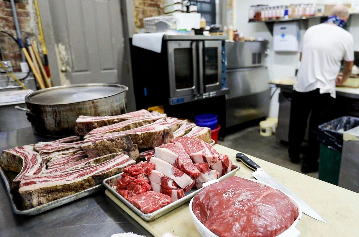 Fresh cuts of meat are prepared for cooking at Local Feed, a scratch farm to table concept in a historic building in downtown Georgetown. Local Feed offers new takes on standards like fried chicken and catfish but also pushes the Southern envelope with Waygu beef meatloaf and specials like the excellent smashed turnips with garlic confit.