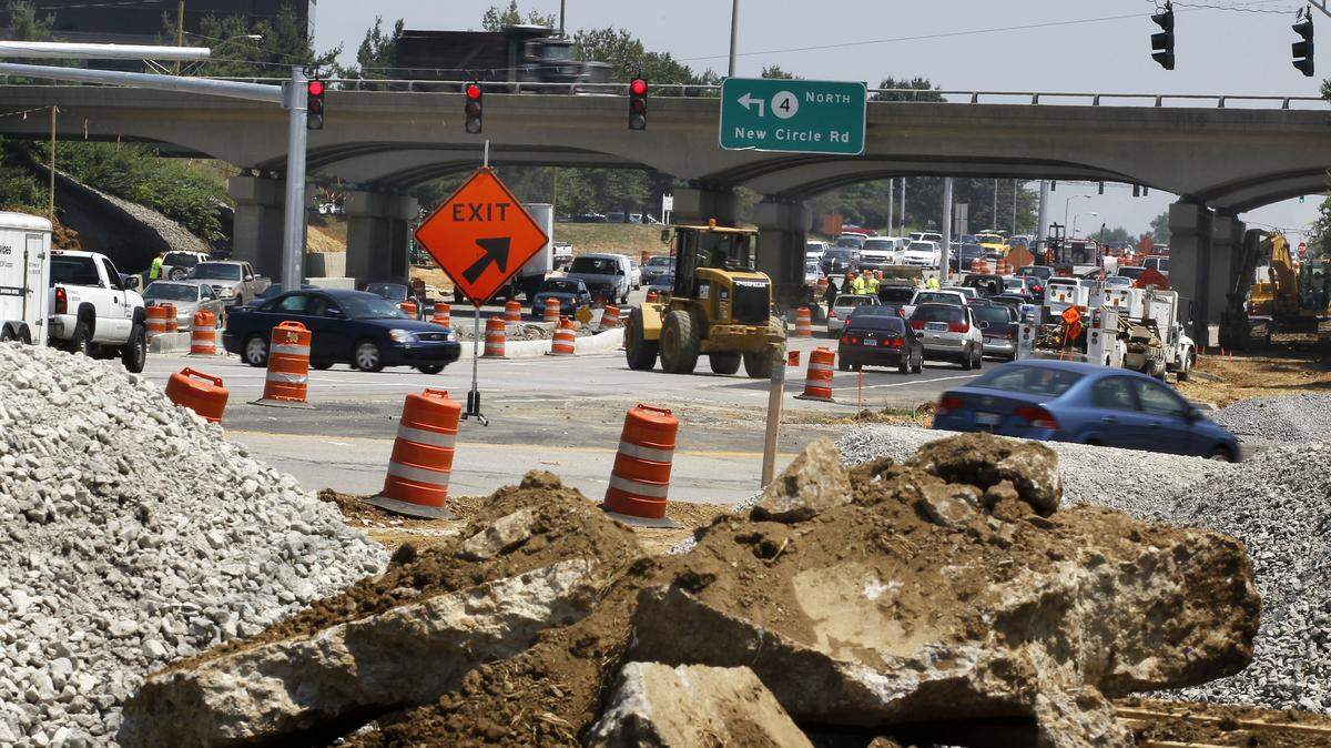 Construction continued Tuesday on the new double crossover diamond interchange at Harrodsburg and New Circle roads. The design eliminates left turns that require drivers to cross in front of oncoming traffic. This view is looking toward downtown.