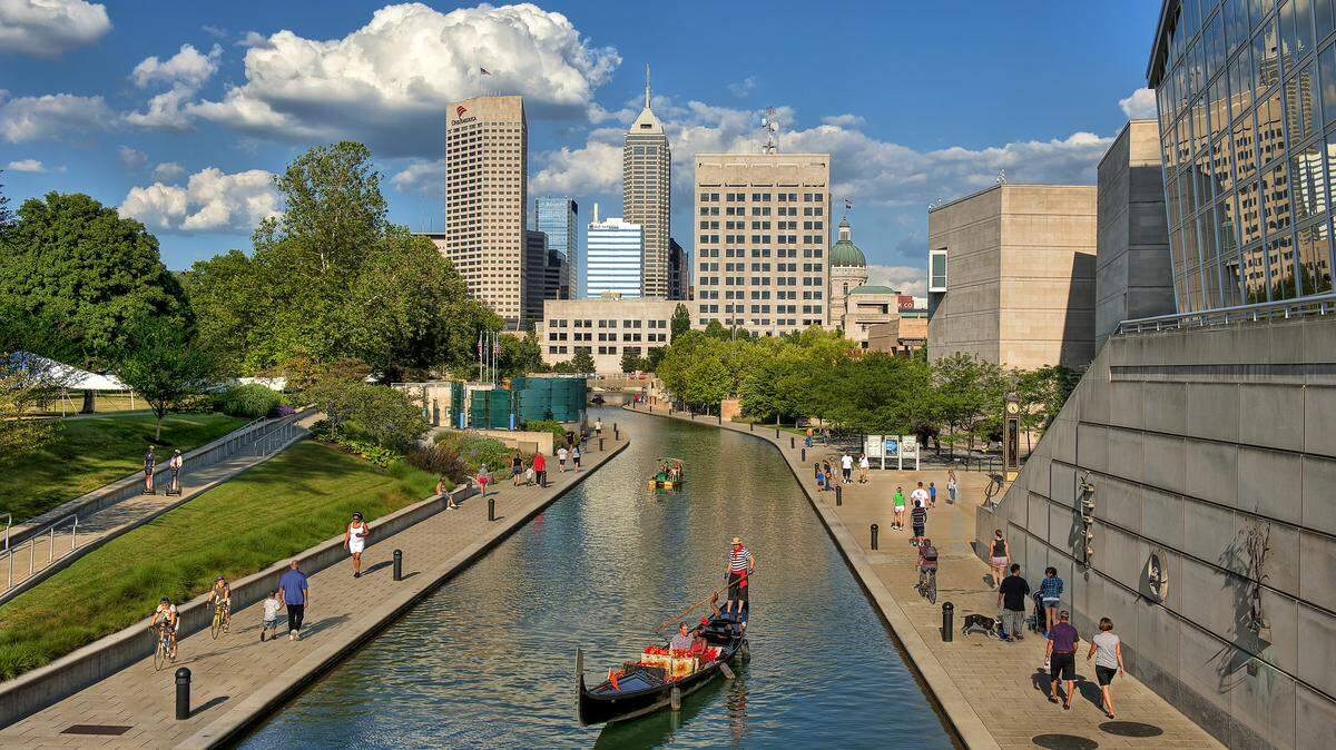 A gondolier takes passengers on a cruise of the three-mile downtown canal loop.
