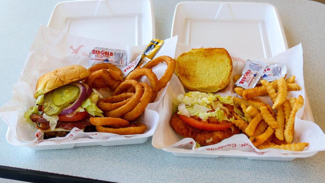 Cheese burger and chicken sandwich served from dkGrill within Double Kwik convenience store in Nicholasville, Feb. 15, 2021.