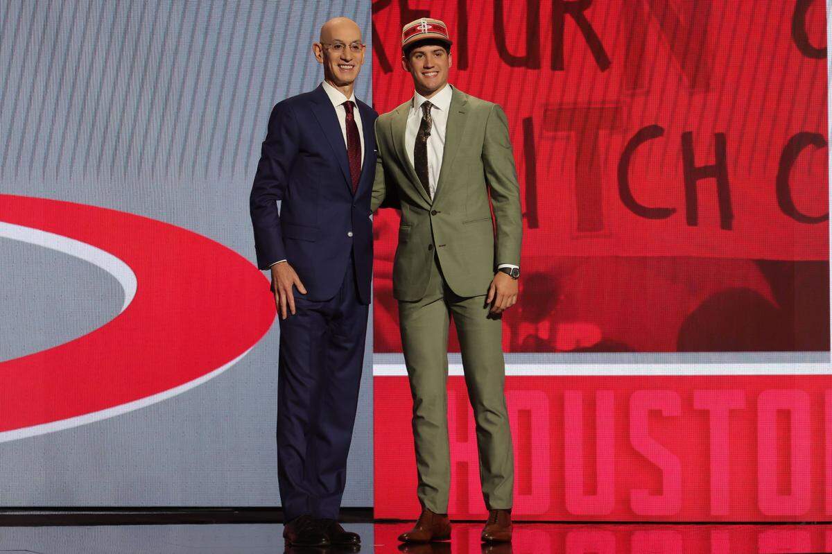Jun 26, 2024; Brooklyn, NY, USA; Reed Sheppard poses for photos with NBA commissioner Adam Silver after being selected in the first round by the Houston Rockets in the 2024 NBA Draft at Barclays Center. Mandatory Credit: Brad Penner-USA TODAY Sports