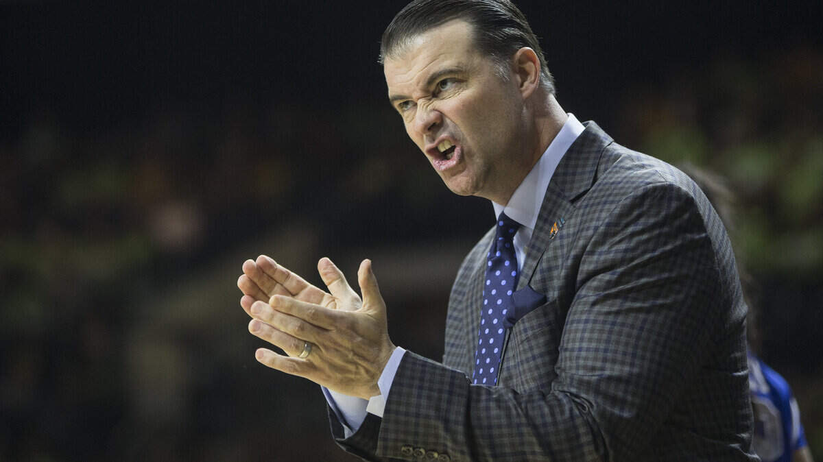 Kentucky Head Coach Matthew Mitchell claps during the NCAA women's basketball Sweet Sixteen tournament game on Saturday, March 29, 2014, inside the Purcell Pavilion at the Joyce Center on the campus of the University of Notre Dame in South Bend, Ind. (Photo by ROBERT FRANKLIN)