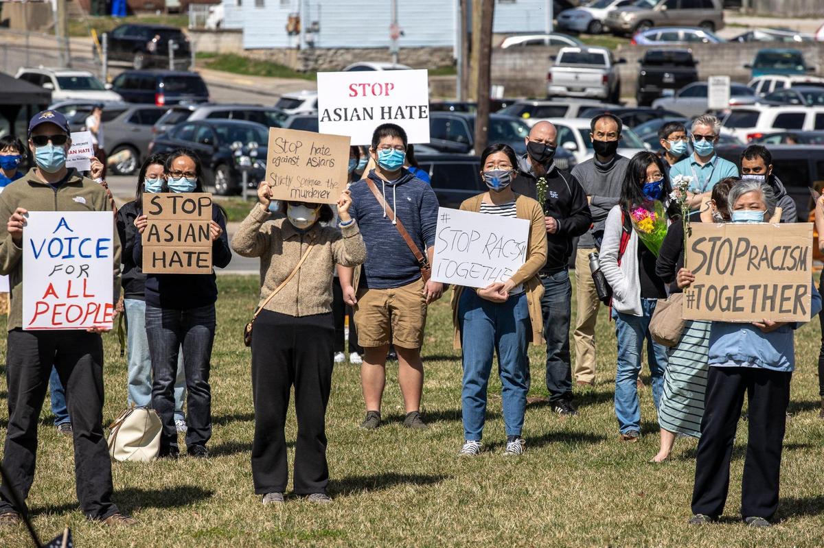 Hundreds of University of Kentucky students, staff and faculty attend a Stop Asian Hate rally on the front lawn of Memorial Hall on the campus in Lexington, Ky., on Wednesday,March 24, 2021.