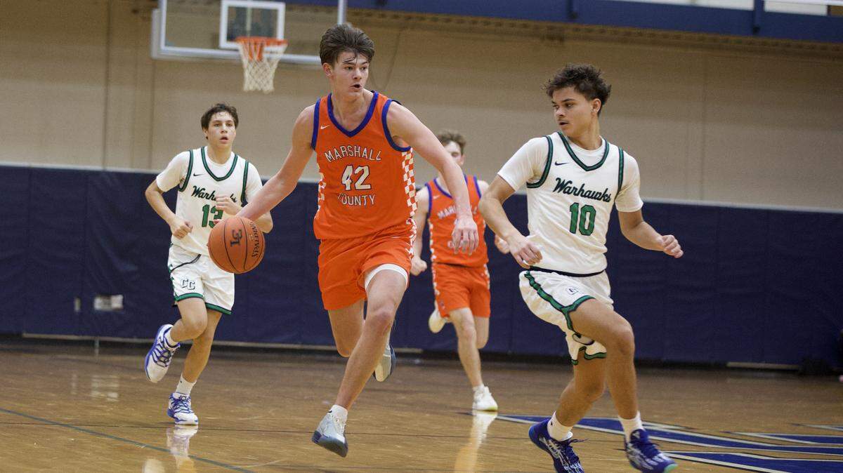 Marshall County junior Matthew Langhi (42) is averaging 27.1 points and 5.1 rebounds per game for the Marshals this season.