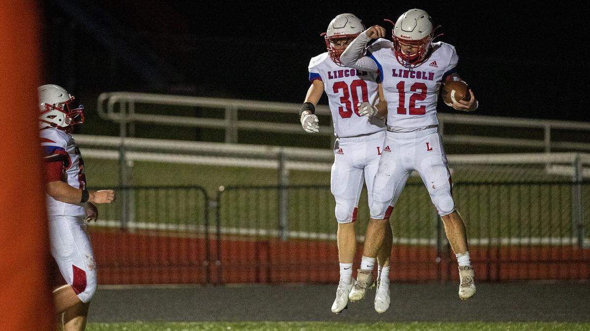 Lincoln County’s Lee Amon (12) celebrated a TD with a teammate in the Patriots’ game against Madison Central last season. Lee is among this week’s nominees for Kentucky.com Offensive Player of the Week.