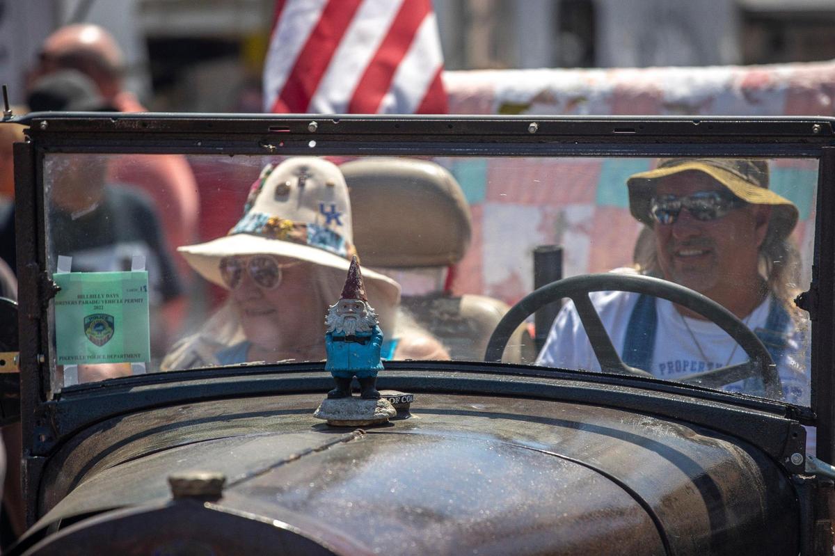 A vehicle in the Hillbilly Parade is driven along Hambley Boulevard during Hillbilly Days in downtown Pikeville, Ky., on Saturday, April 23, 2022. This marked the first time the event was held since 2019.