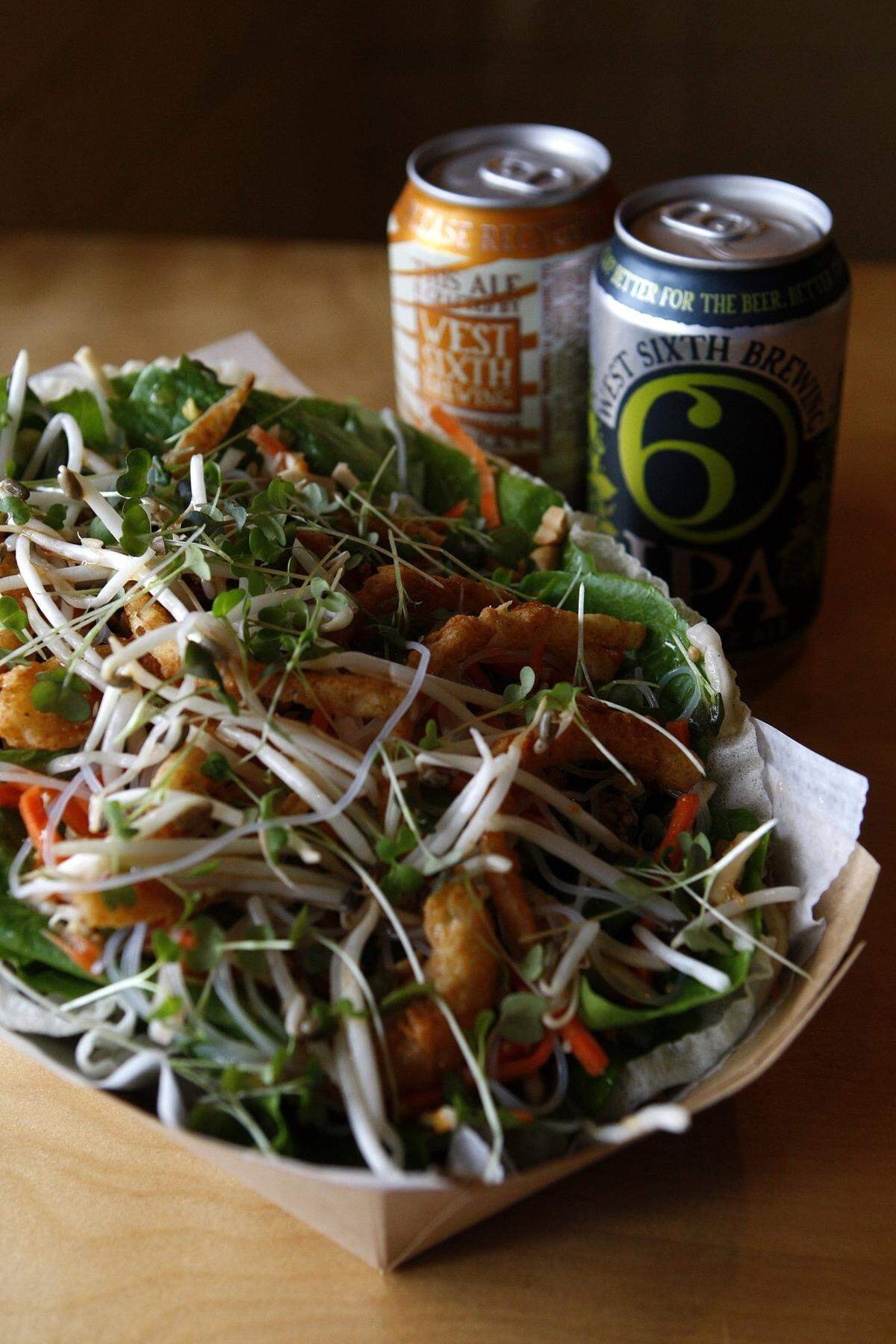 Smithtown Seafood’s Singapore Salad features Food Chain’s special lettuce with sweet-and-spicy pickled vegetables, Thai basil, cilantro, mint, bean sprouts, crispy fried onions and crushed peanuts with rice noodles and Ginger-Soy vinaigrette in a crispy rice paper bowl.