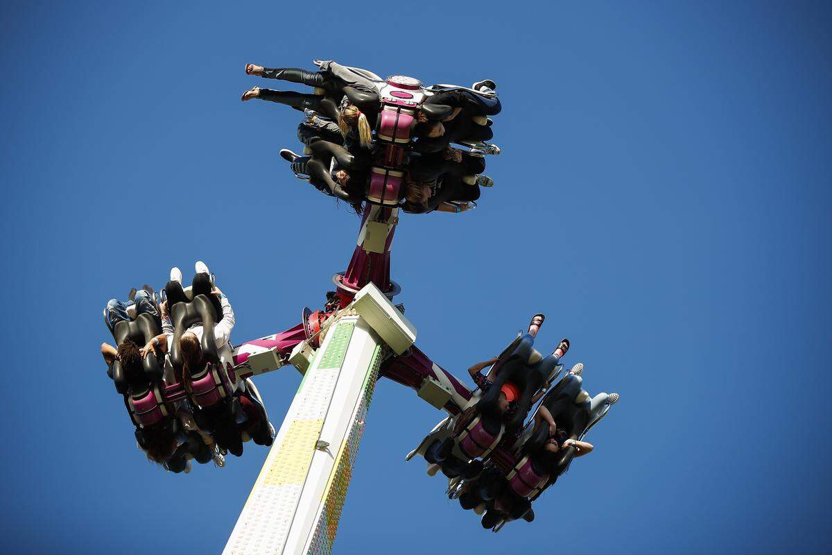 Fairgoers ride the Nemesis 360 during the Lexington Lions Club Bluegrass Fair at Masterson Station Park in Lexington, Thursday, June 13, 2019. 