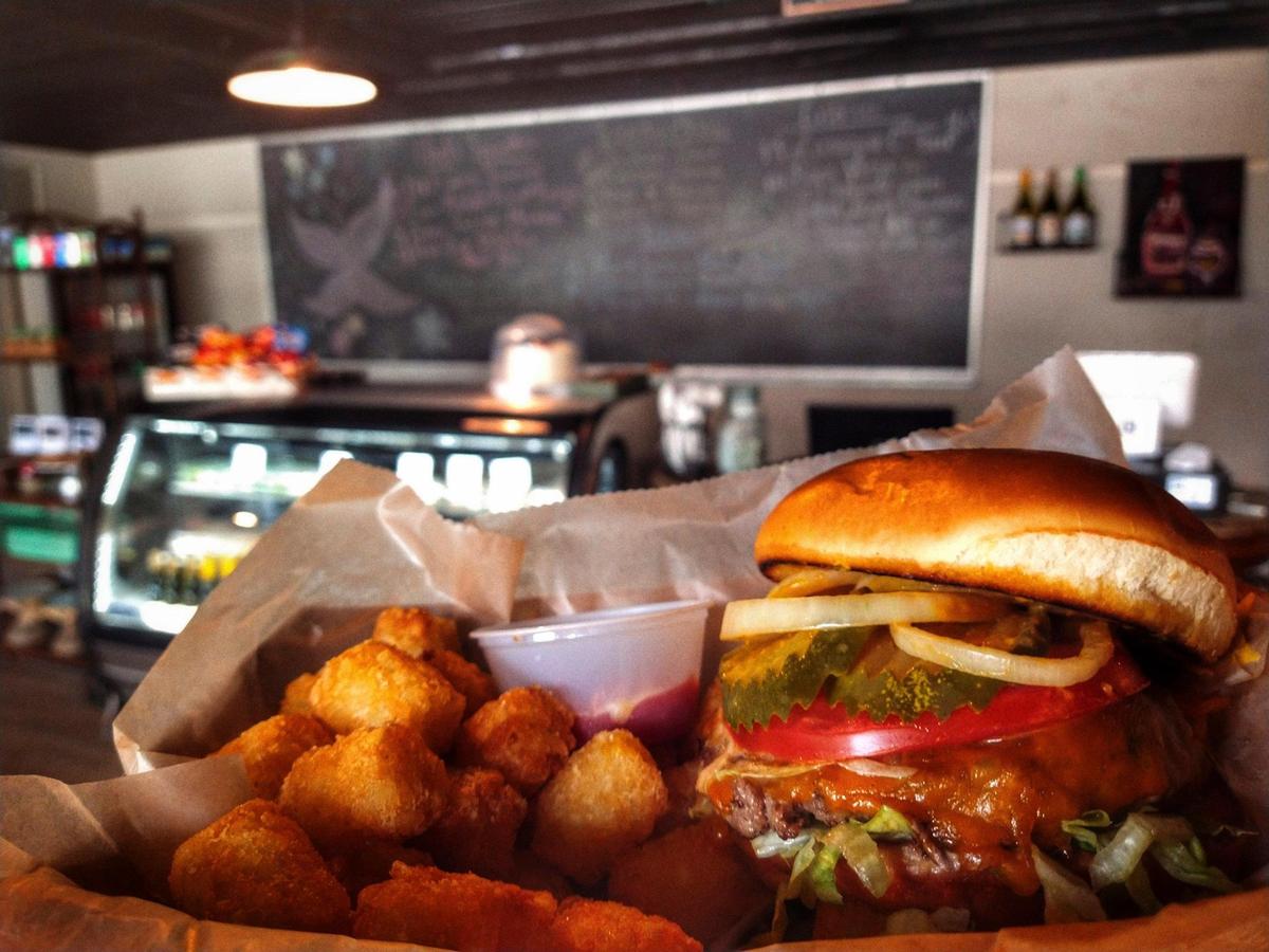 The house burger with tots is made from locally sourced beef from Evans Mill Cattle Co.