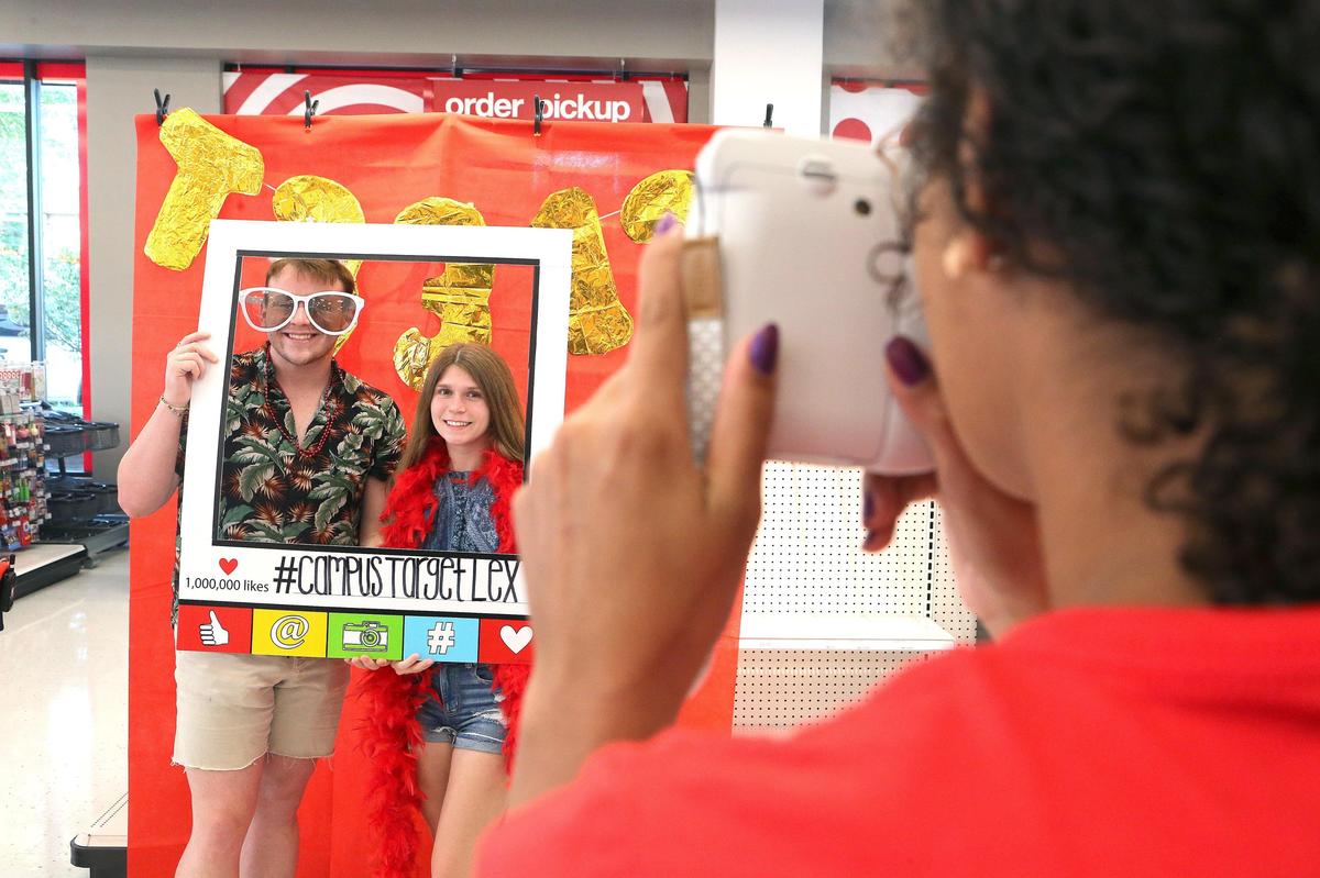 UK students Bailey Maynard, left, and Emileigh Jewell posed in the photo booth Tuesday at the new Target store on the UK campus.