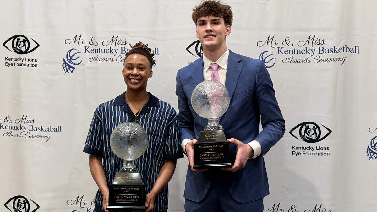 Assumption’s Ashlinn James, left, and Madison Central’s Jake Feldhaus pose with their respective Kentucky Miss Basketball and Mr. Basketball trophies presented by the Kentucky Lions Eye Foundation and the Kentucky Association of Basketball Coaches at the Griffin Gate Marriott on March 22. 