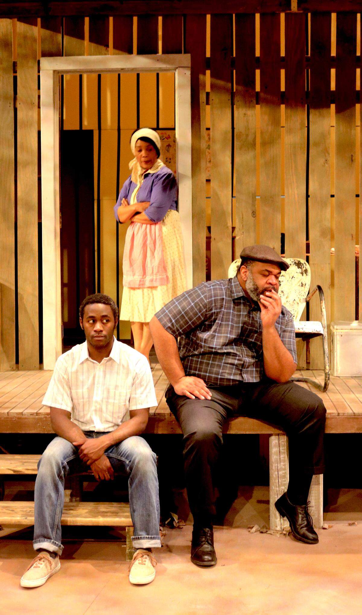AthensWest Theatre Co. presents August Wilson’s “Fences” with, from left, Darryl Whitfield as Cory, Nieta Wigginton as Rose and Alphaeus Green Jr. as Troy.