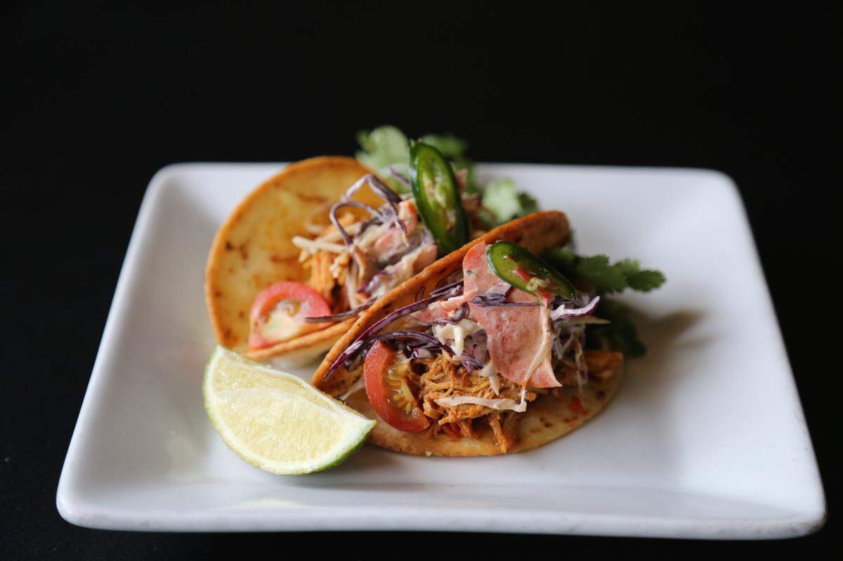 At Minglewood, you can get two Mojo and beer-braised chicken tacos for $5 during Crave Taco Week.