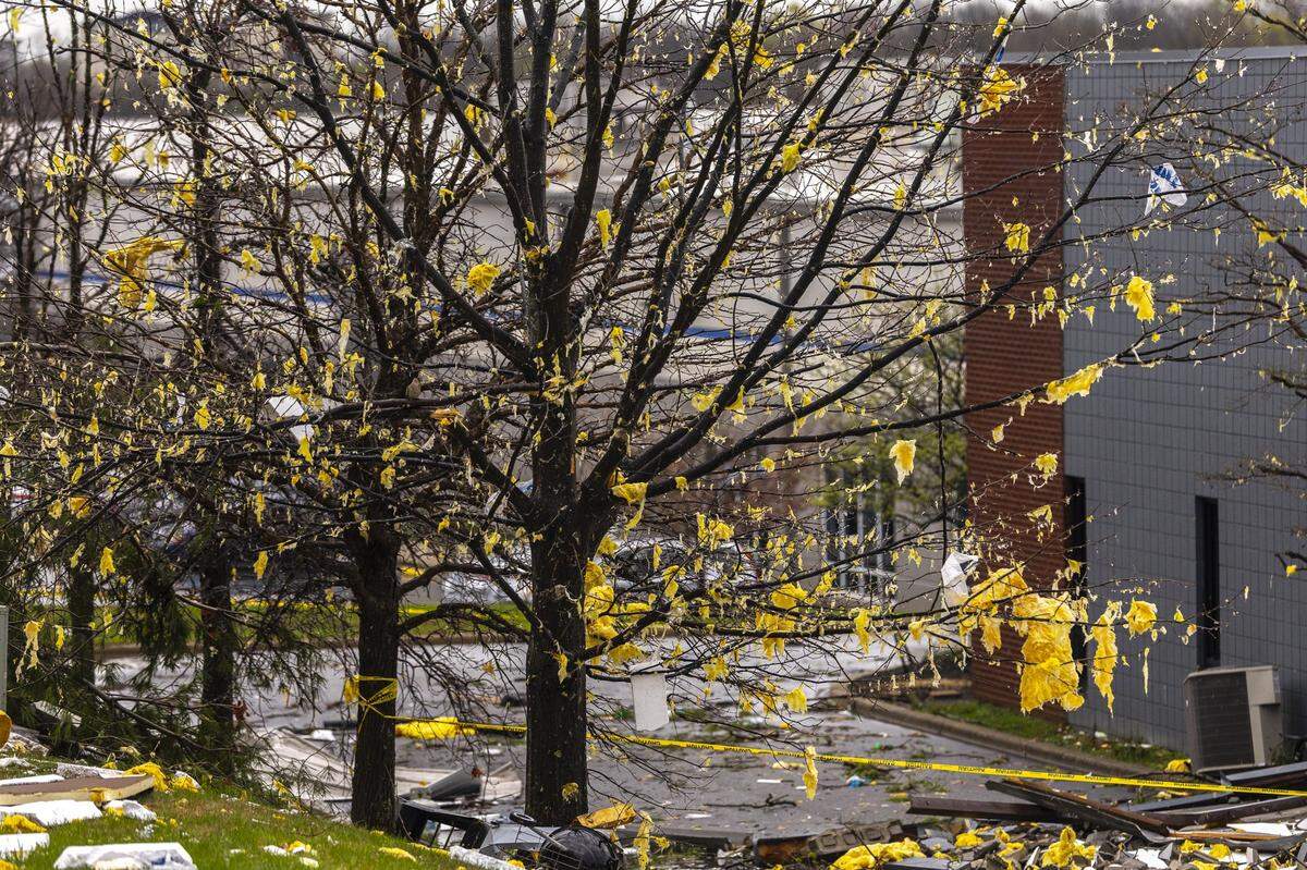 Insulation hangs in trees near Plantside Drive in Louisville, Ky., on Thursday, April 3, 2025. High winds caused significant damage overnight Wednesday, April 2 to Thursday April 3, 2025.
