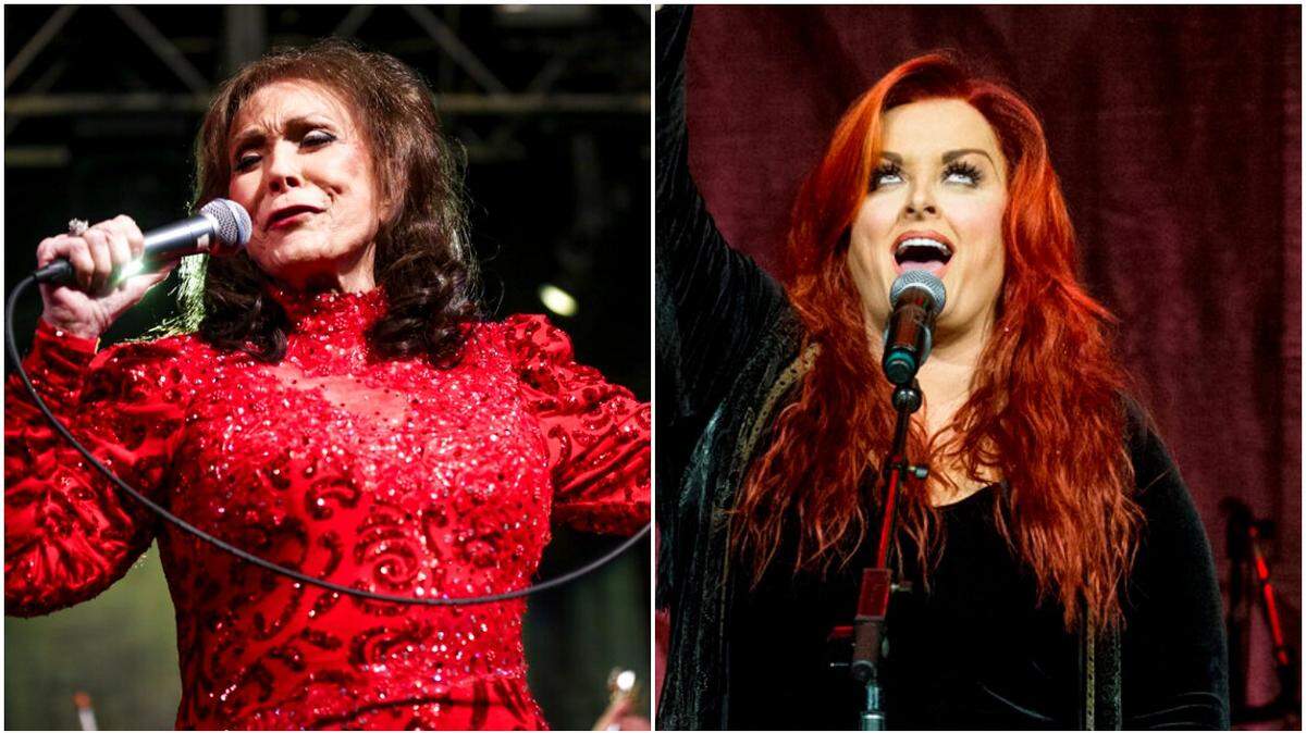 Loretta Lynn, left, gave Wynonna Judd, right, advice before Judd performed at the CMT Awards on Monday, April 11.