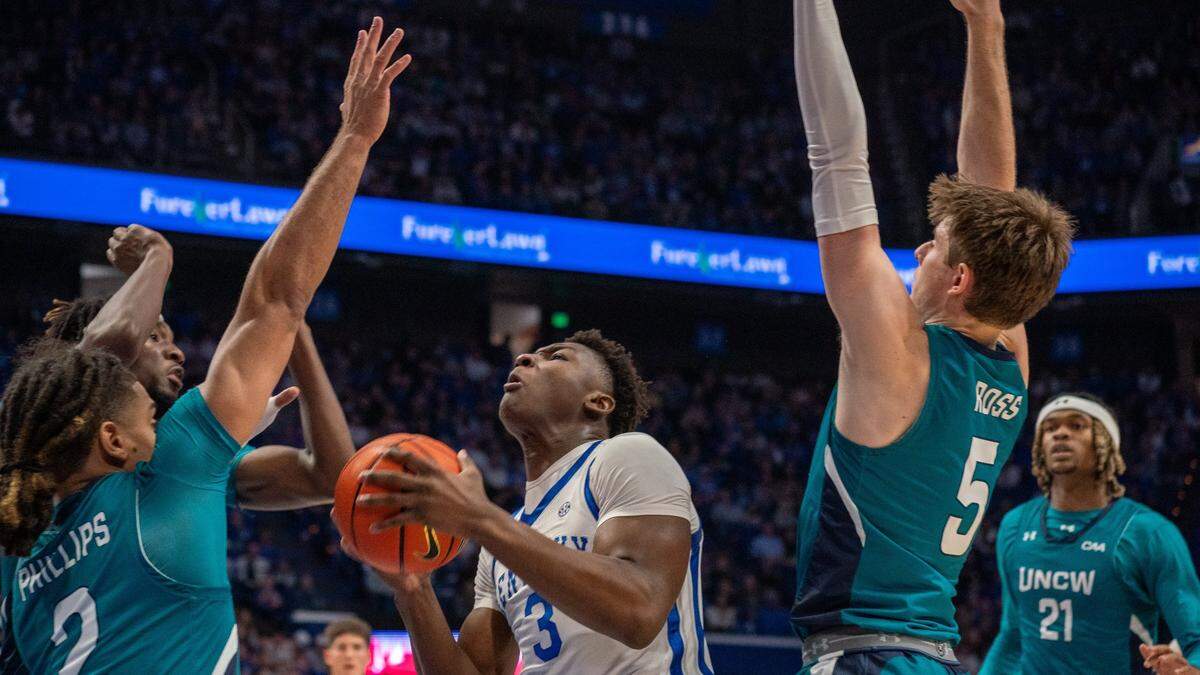 Kentucky’s Adou Thiero (3) looks for room to operate against a UNC Wilmington defense that held the Wildcats to a season-low 73 points.