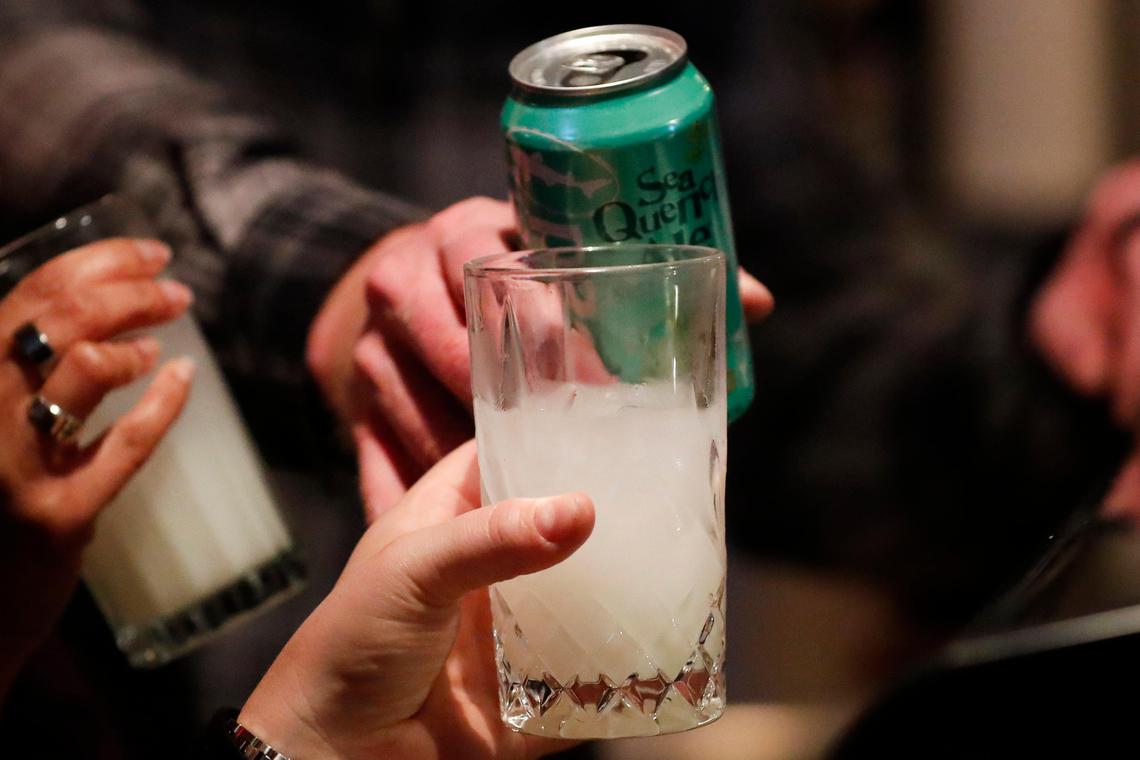 Customers drink shochu cocktails and Dogfish Head Seaquench Ale at Standing Room Only. The Japanese izakaya offers a wide array of sakis and shochu, Japanese distilled alcohol, and Japanese beer.