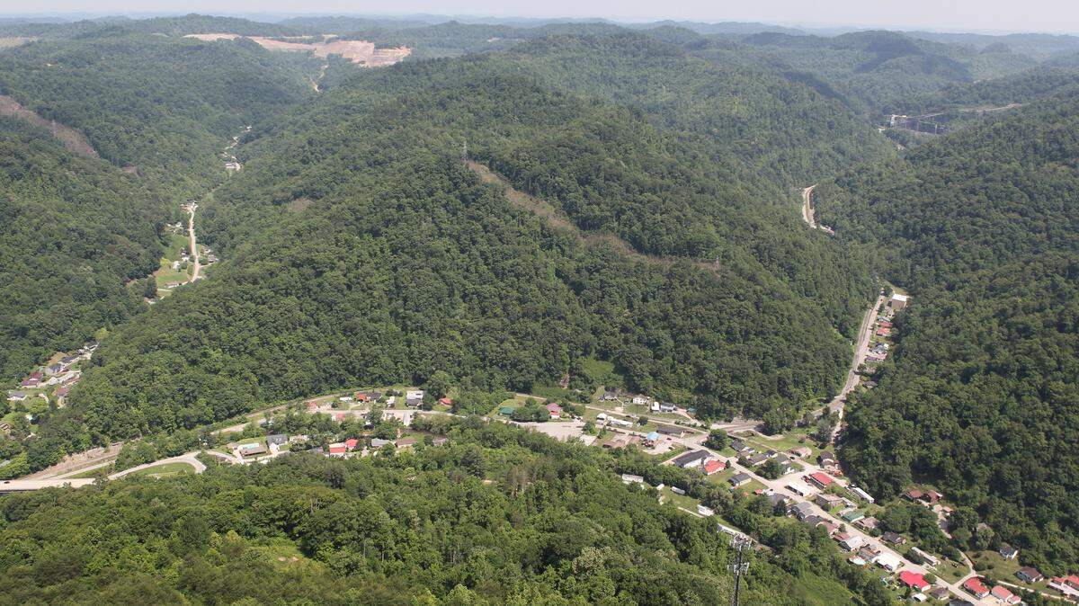 A ruling last week by a federal judge in Louisville clears the way to mine the mountain that runs above Main Street, in the foreground, in the Knott County town of Sassafras.