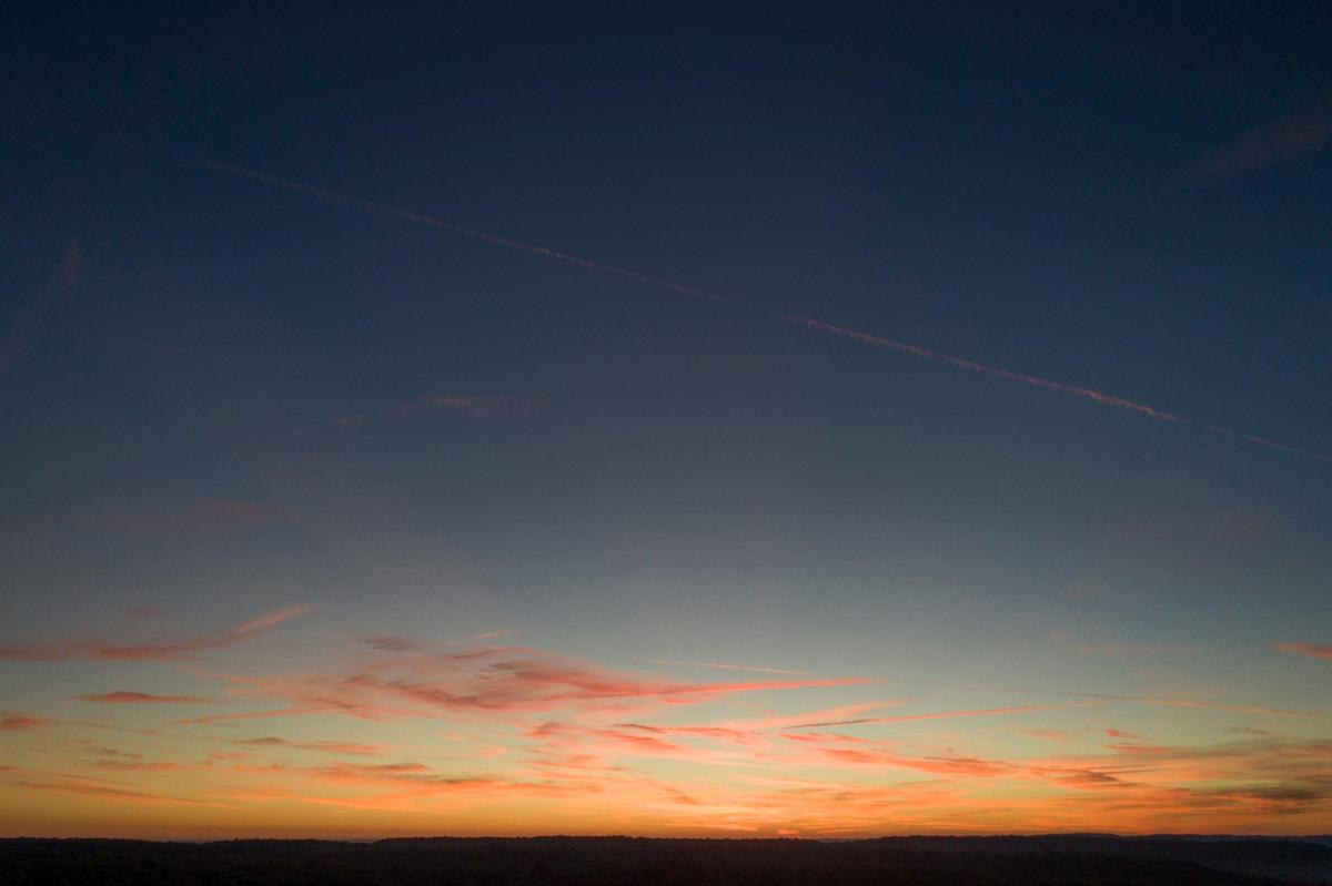Dawn breaks at the Bernheim Arboretum and Research Forest in Clermont, Ky., on Wednesday, Oct. 27, 2021.