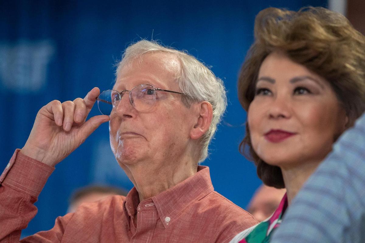Senate Minority Leader Mitch McConnell (R-Ky.) and his wife, former U.S. secretary of labor and transportation Elaine Chao, attend the annual St. Jerome Fancy Farm Picnic in Fancy Farm, Ky., on Saturday, Aug. 5, 2023.