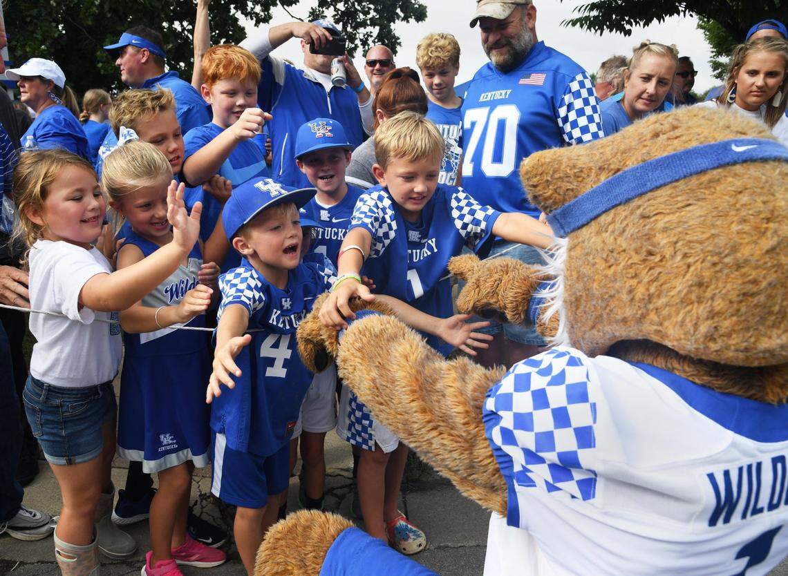 UK’s Wildcat mascot greets young fans before a game last season at Kroger Field. Kentucky has sold more than 36,000 season tickets. Single-game tickets, which could be “very limited” for the biggest games, go on sale in July.