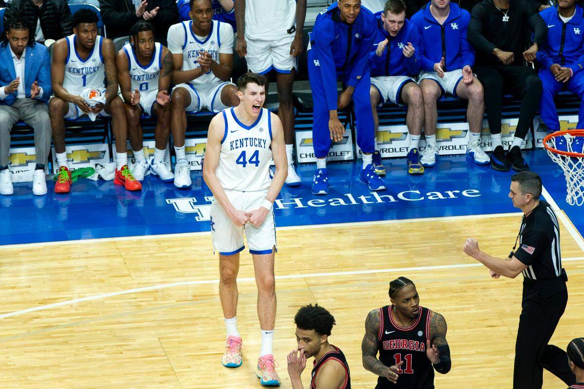 Kentucky forward Zvonimir Ivisic (44) celebrates a basket by one of his teammates during Saturday’s win against Georgia. Big Z finished with 13 points, five rebounds and three blocks in his Wildcats debut.