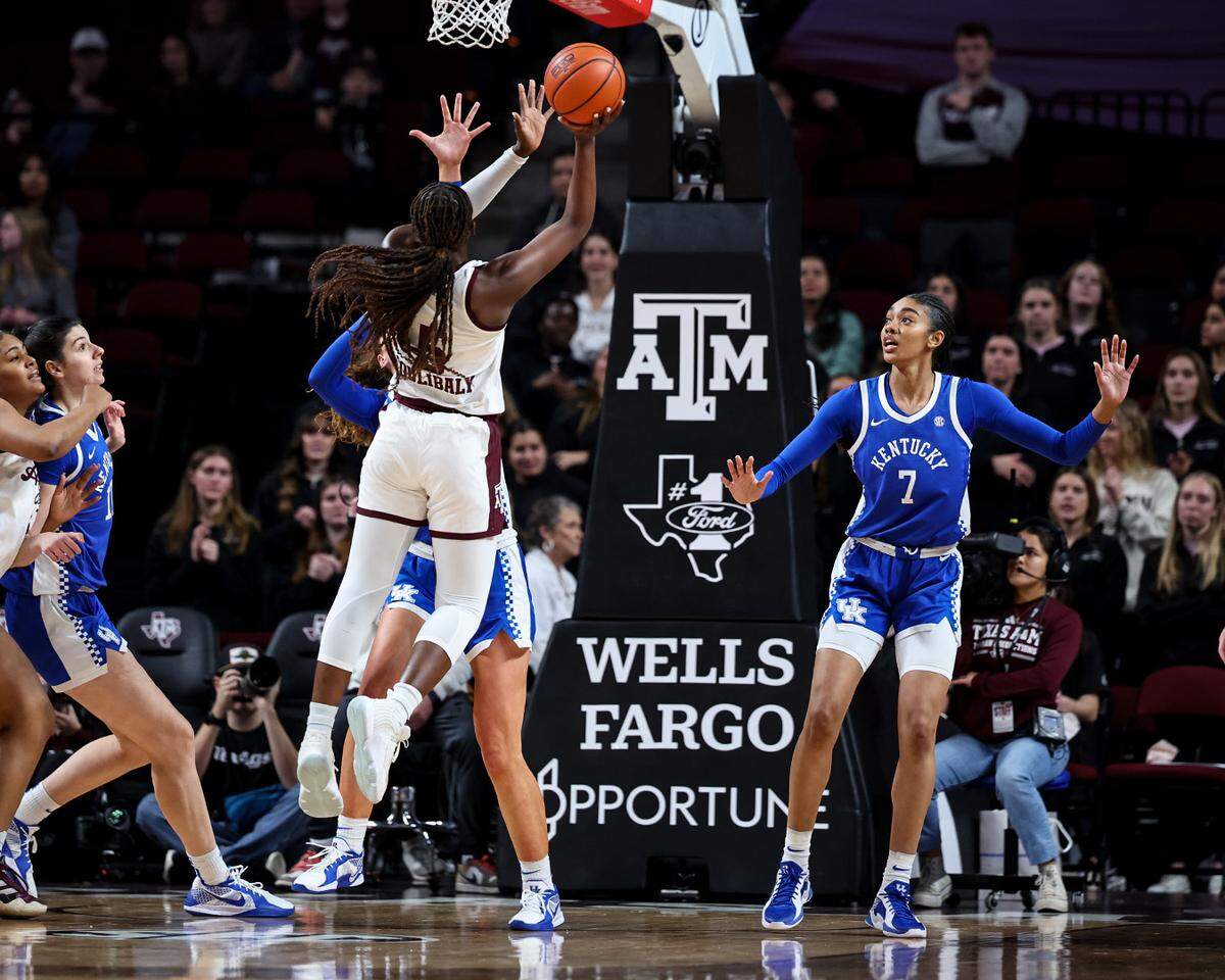 Aicha Coulibaly (5) led Texas A&M with 21 points. Teonni Key (7) led Kentucky with 20.