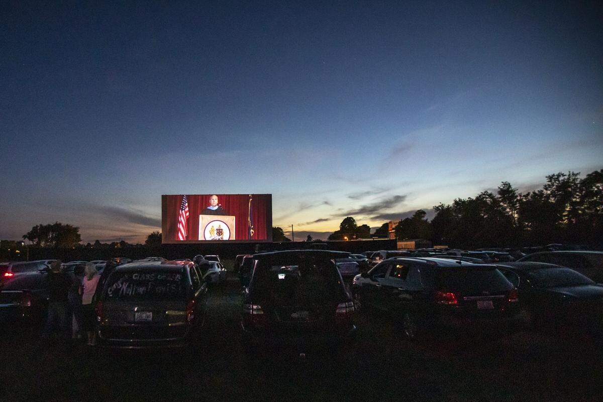 Pulaski County High School Principal Rodney McAninch is shown on a movie screen May 30 at the 27 Twin Drive-in Theater in Somerset during the school’s drive-in graduation ceremony. To maintain social distancing, the school held a drive-thru and then a drive-in ceremony for graduating seniors.