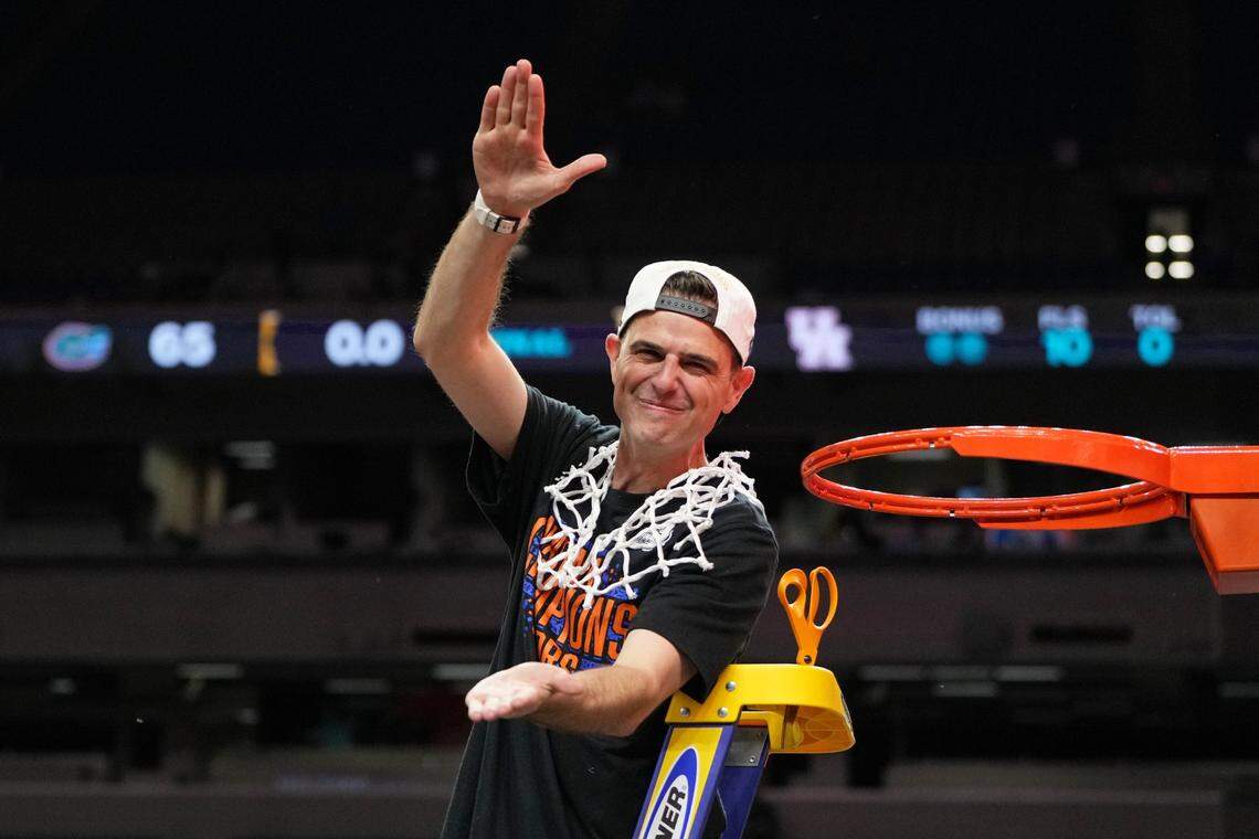 Florida coach Todd Golden did the “Gator chomp” after cutting down the net following UF’s 65-63 win over Houston in the 2025 men’s NCAA basketball tournament championship game.
