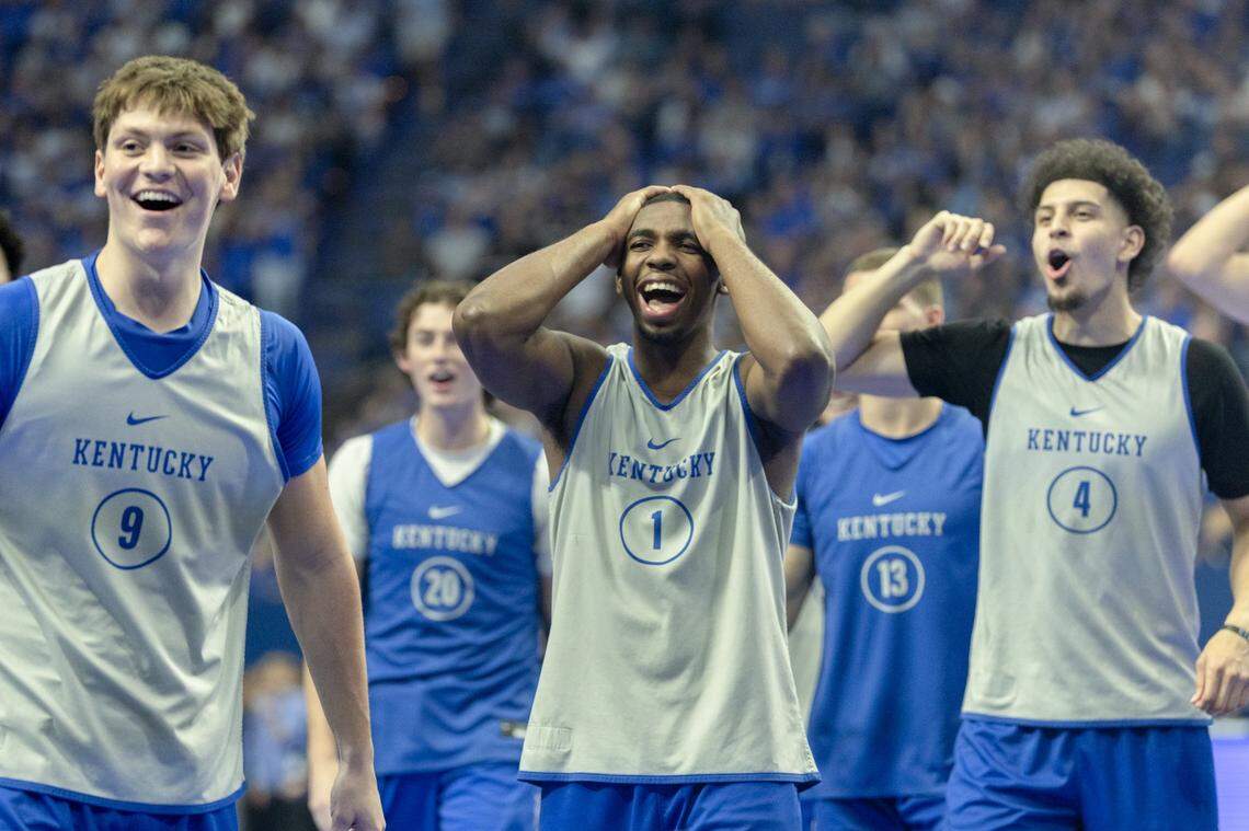 Kentucky players Trent Noah, left, Lamont Butler, center, and Koby Brea react to a moment during the team’s Big Blue Madness event in Rupp Arena on Friday night.