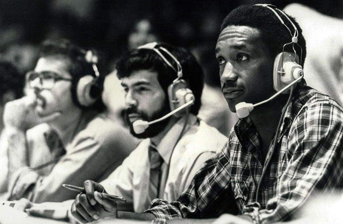 Jack Givens, right, and Dick Gabriel, center, call a high school basketball game for WVLK in 1981.