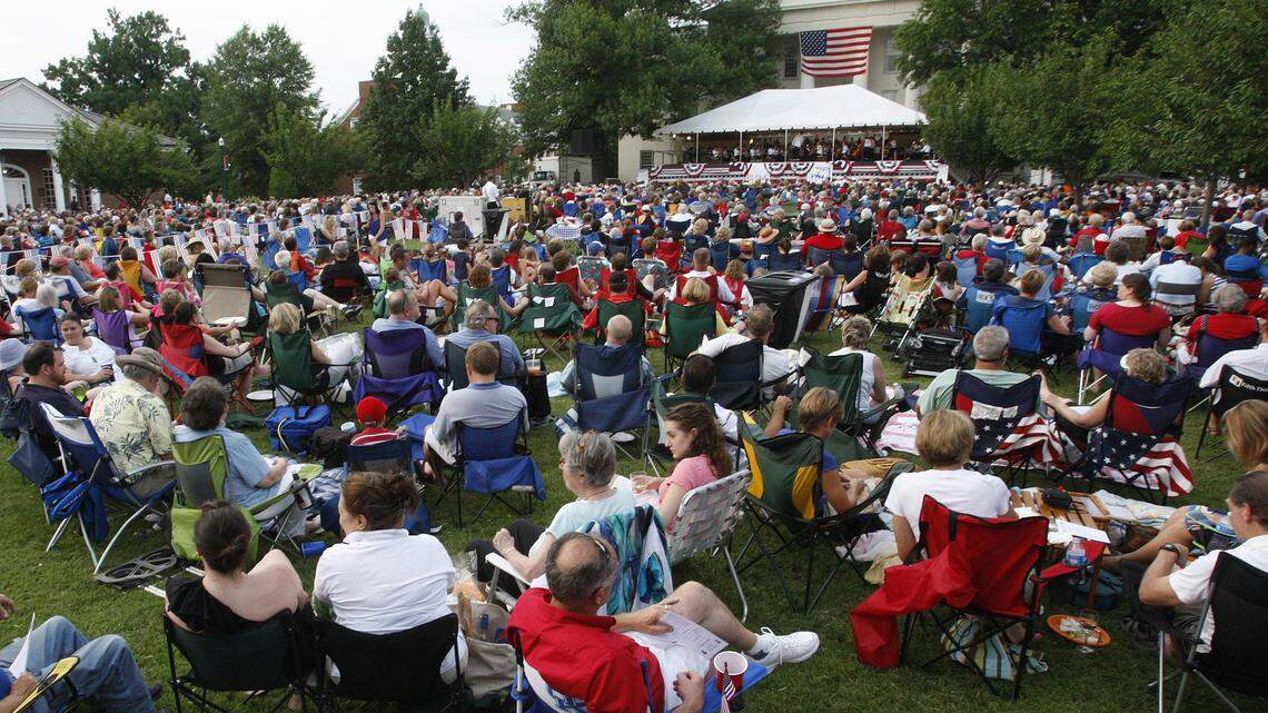 A large crowd watches during a patriotic music concert, featuring the Lexington Philharmonic & Lexington Singers, on the lawn of Old Morrison at Transylvania University in Lexington, Ky., Sunday, July 3, 2011. Photo by Matt Goins 12228
