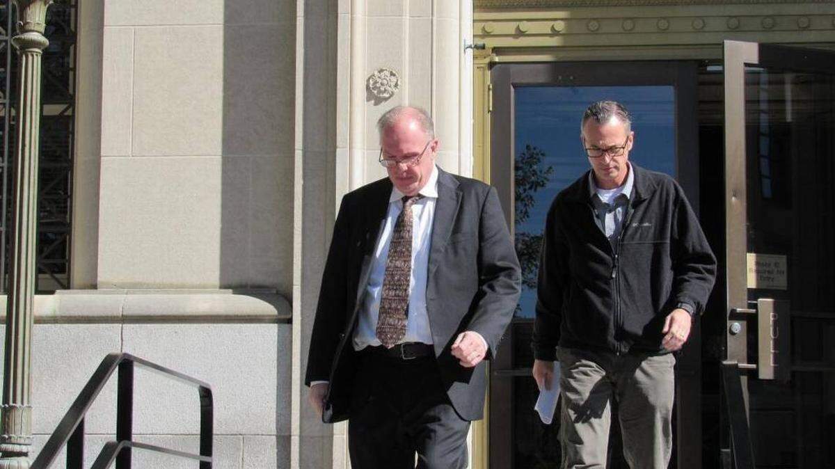 Curtis Lee Wyatt, left, exited federal court in Lexington in October 2017 after being arraigned on charges of helping fugitive former disability lawyer Eric C. Conn escape before he was sentenced in a massive fraud case. Wyatt worked for Conn at his firm in Floyd County.