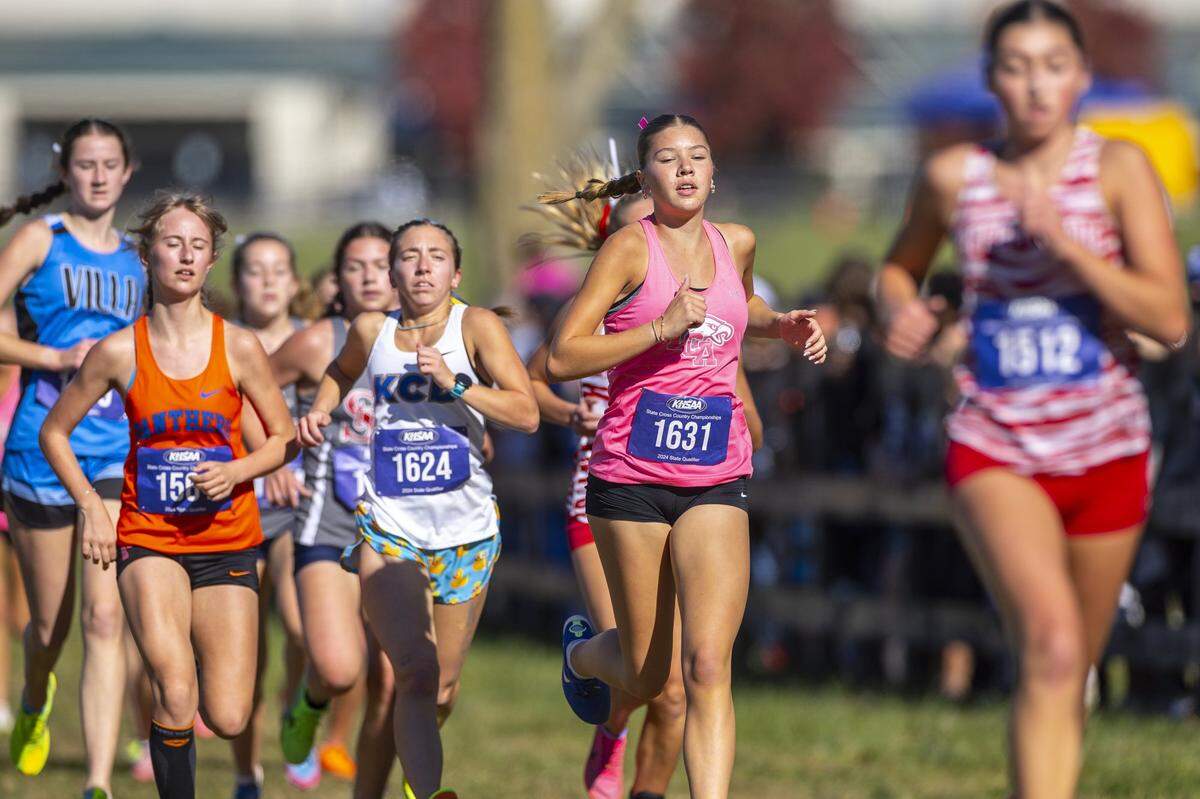 Lexington Christian’s Violet Griese (1631) runs during the Class A girls state cross country meet at the Kentucky Horse Park. LCA won the team title.