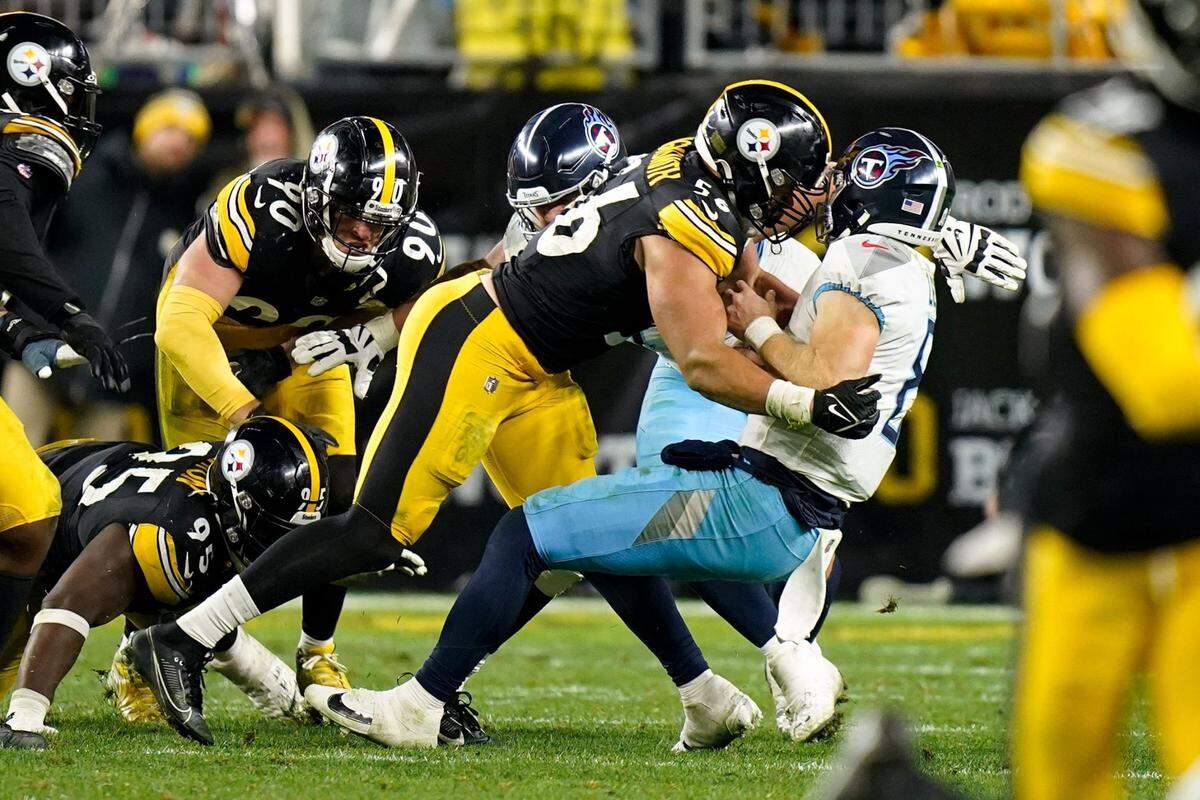 Tennessee quarterback Will Levis, right, is sacked by Steelers linebacker Alex Highsmith (56) during the fourth quarter in Pittsburgh on Thursday night.