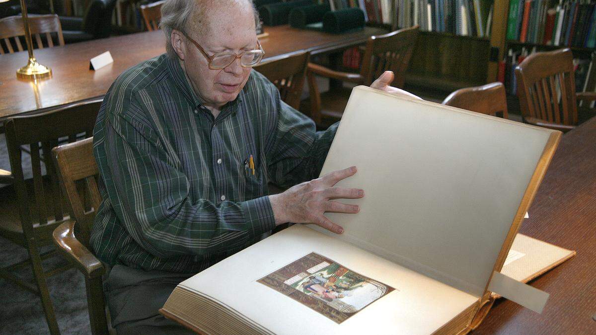 Frank Stanger, a Special Collections research assistant at the University of Kentucky, looked at a reproduction from a 16th-century book of the liturgy of the Mass.