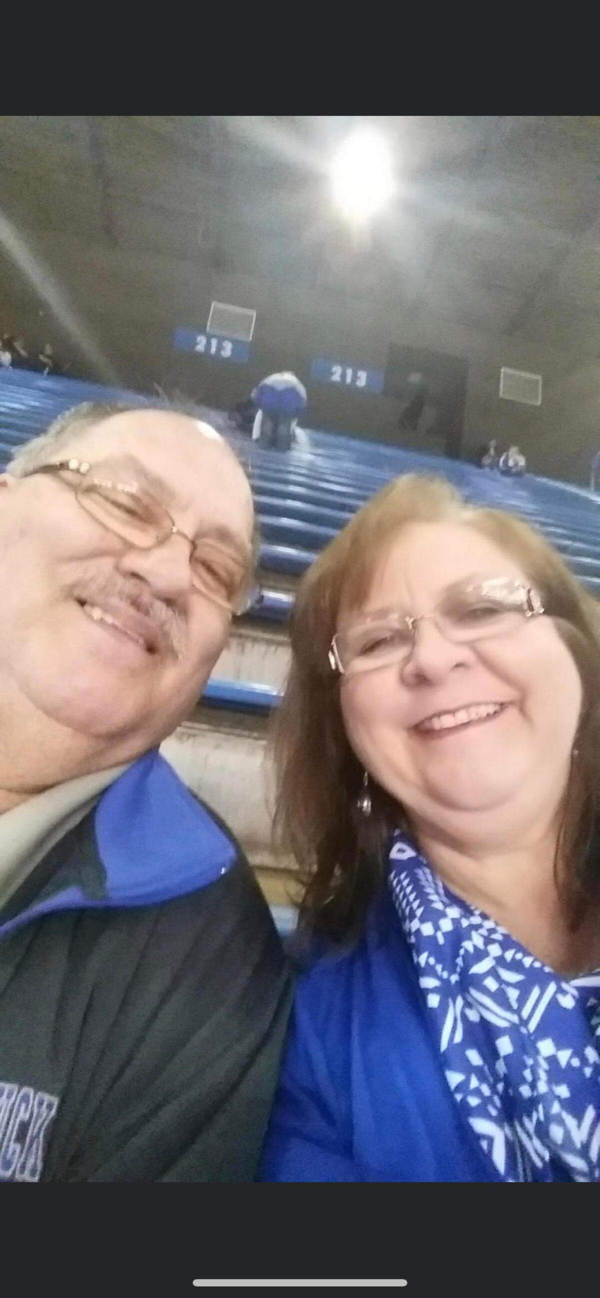Sherri Mounce, shown with her husband Jim at Rupp Arena, died Aug. 18 after contracting COVID-19