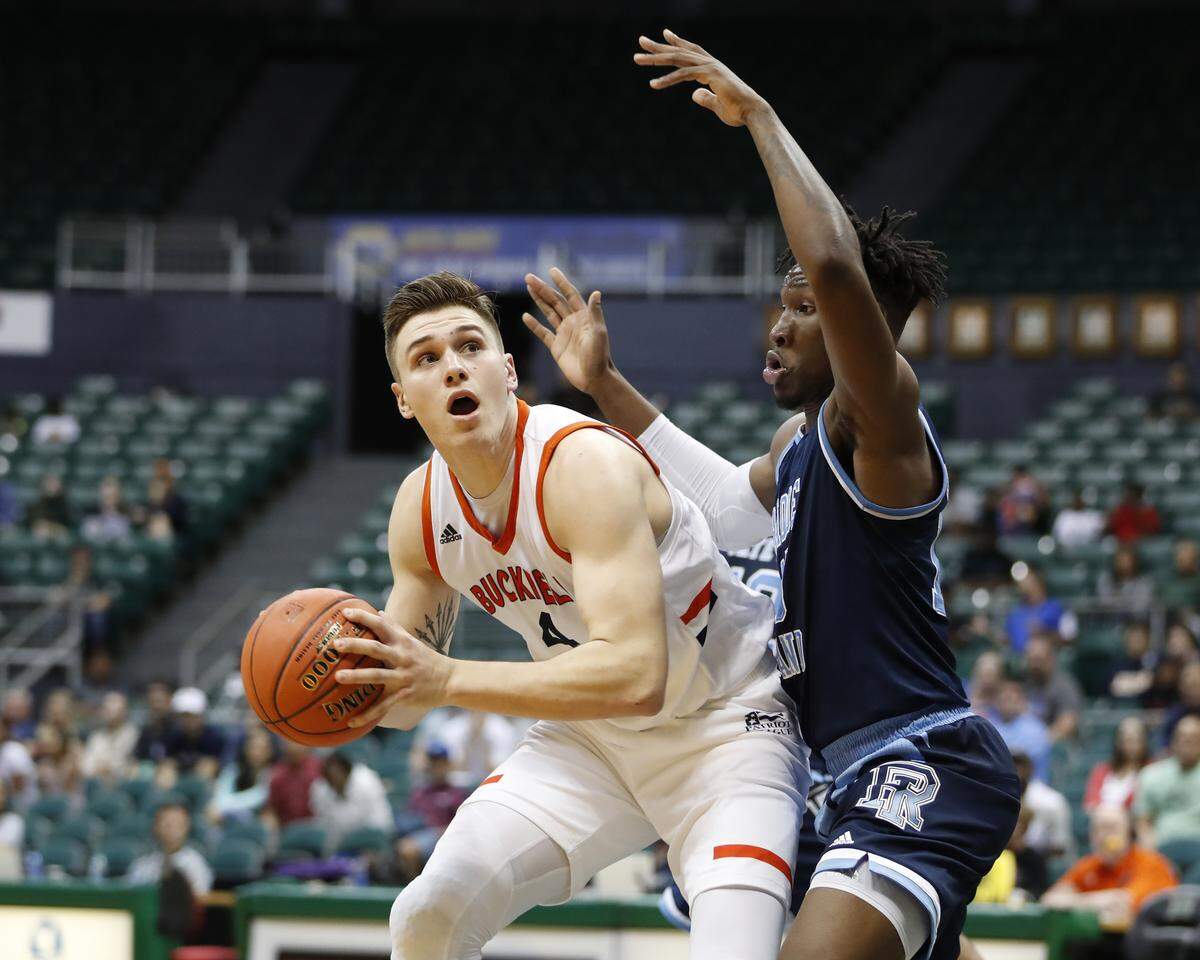 Nate Sestina, left, will join Kentucky next season as a graduate transfer after averaging 15.8 points and 8.5 rebounds this past season for Bucknell.