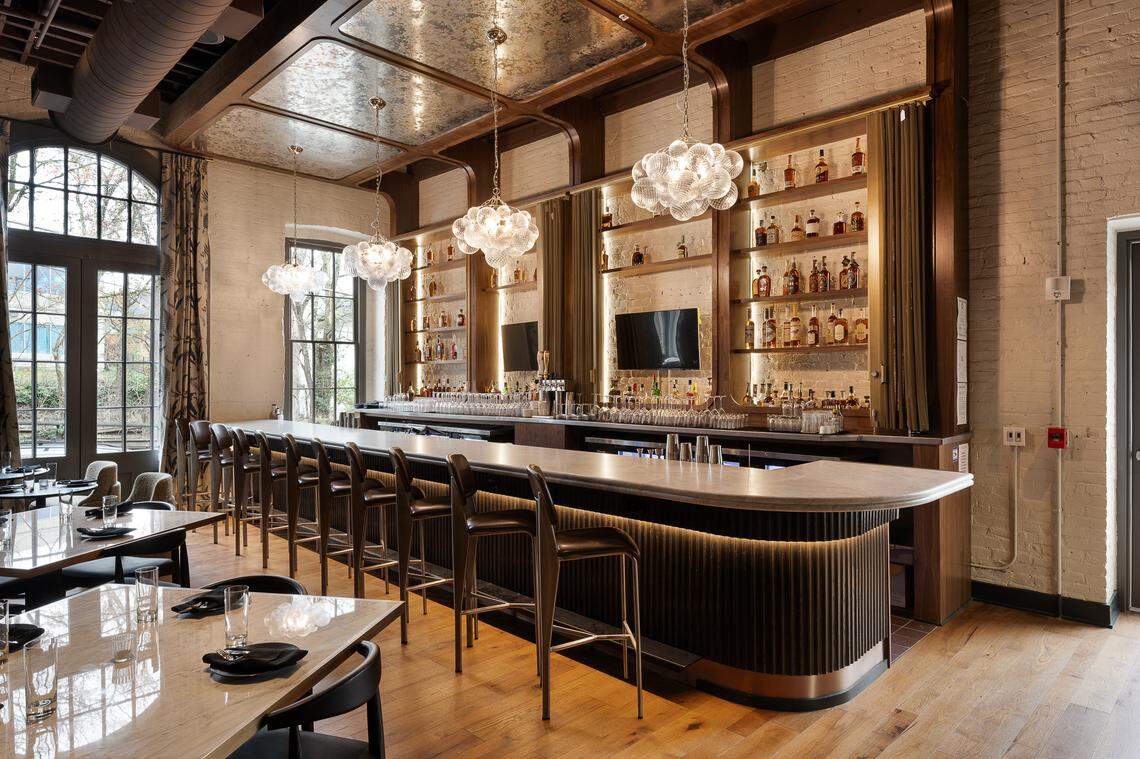 The bar inside the Delegate Hotel has exposed brick walls from the building’s previous life as a warehouse.